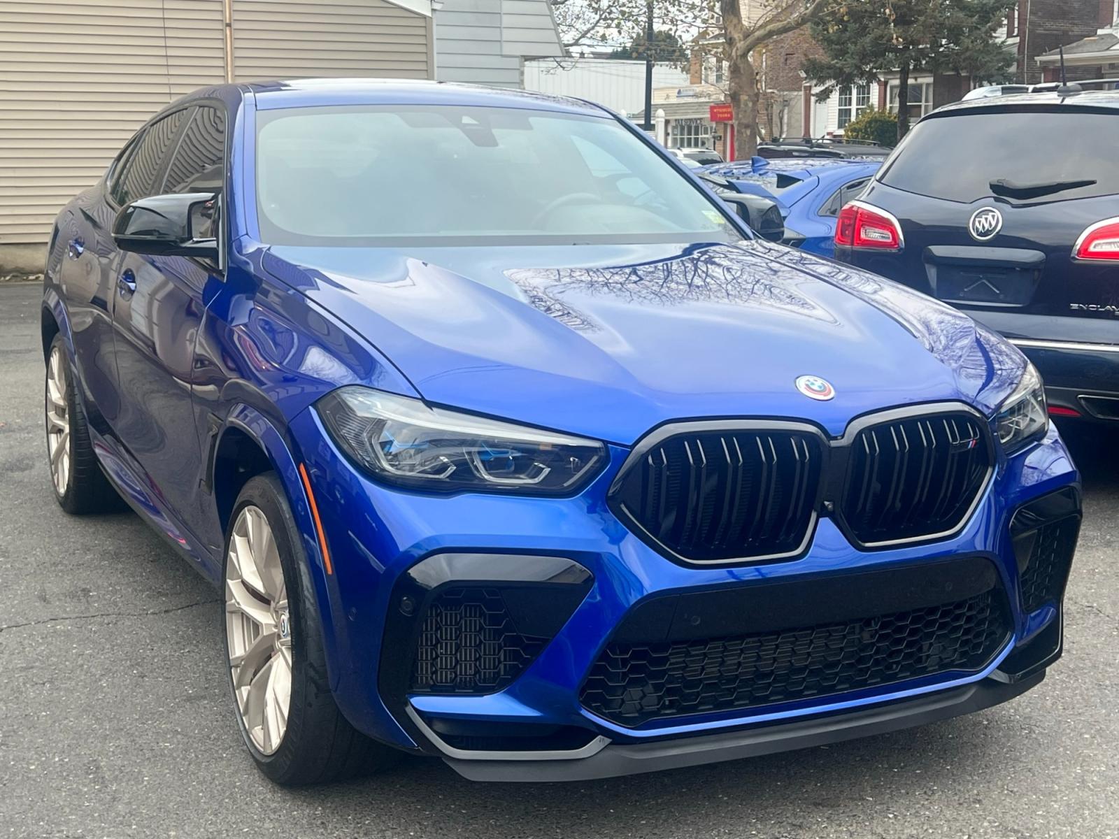 2022 Blue /Red/Black BMW X6 M Base (5YMCY0C07N9) with an 4.4L V8 DOHC 32V engine, 8A transmission, located at 1018 Brunswick Ave, Trenton, NJ, 08638, (609) 989-0900, 40.240086, -74.748085 - Holy Cow and Wow!!...That is the description on this absolutely stunning BMW X6 M Competition! Ordered by Anthony himself with the best color choice of Marina Bay Blue metallic and Red Interior to stand out on the road and to any enthusiast of the BMW X series! Executive Pkg. includes Remote Start, - Photo #2